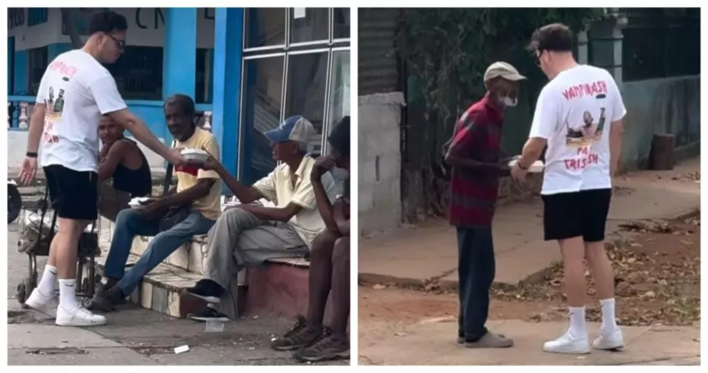 Sandro Castro entregando cajas de comida a personas vulnerables en La Habana.