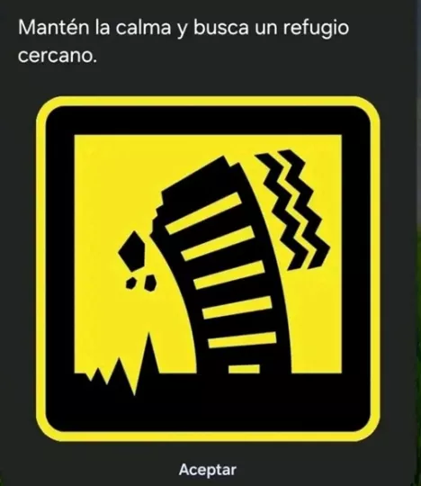 Captura de pantalla de un teléfono móvil mostrando una notificación de alerta de terremoto falsa recibida en Cuba.