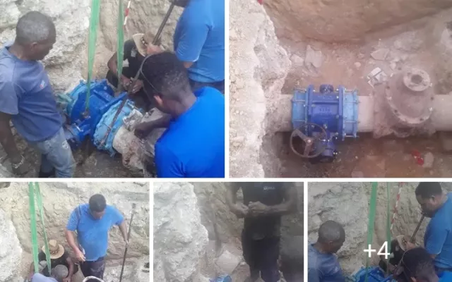 Técnicos realizando labores de mantenimiento y sustitución de una válvula en la infraestructura hidráulica de La Habana.